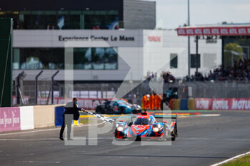 2021-08-22 - 84 Aoki Takuma (jpn), Bailly Nigel (bel), Lahaye Matthieu (fra), Association SRT41, Oreca 07-Gibson, action checkered flag during the 24 Hours of Le Mans 2021, 4th round of the 2021 FIA World Endurance Championship, FIA WEC, on the Circuit de la Sarthe, from August 21 to 22, 2021 in Le Mans, France - Photo Joao Filipe / DPPI - 24 HOURS OF LE MANS 2021, 4TH ROUND OF THE 2021 FIA WORLD ENDURANCE CHAMPIONSHIP, WEC - ENDURANCE - MOTORS