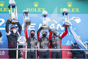 2021-08-22 - 07 Conway Mike (gbr), Kobayashi Kamui (jpn), Lopez Jose Maria (arg), Toyota Gazoo Racing, Toyota GR010 - Hybrid, portrait, podium during the 24 Hours of Le Mans 2021, 4th round of the 2021 FIA World Endurance Championship, FIA WEC, on the Circuit de la Sarthe, from August 21 to 22, 2021 in Le Mans, France - Photo François Flamand / DPPI - 24 HOURS OF LE MANS 2021, 4TH ROUND OF THE 2021 FIA WORLD ENDURANCE CHAMPIONSHIP, WEC - ENDURANCE - MOTORS