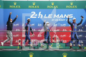 2021-08-22 - 65 Canal Julien (fra), Stevens Will (gbr), Allen James (aus), Panis Racing, Oreca 07 - Gibson, celebrating their podium during the 24 Hours of Le Mans 2021, 4th round of the 2021 FIA World Endurance Championship, FIA WEC, on the Circuit de la Sarthe, from August 21 to 22, 2021 in Le Mans, France - Photo Xavi Bonilla / DPPI - 24 HOURS OF LE MANS 2021, 4TH ROUND OF THE 2021 FIA WORLD ENDURANCE CHAMPIONSHIP, WEC - ENDURANCE - MOTORS