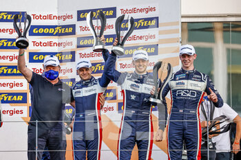 2021-10-24 - 22 Hanson Phil (gbr), Aberdein Jonathan (zaf), Gamble Tom (gbr), United Autosports, Oreca 07 - Gibson, portrait podium during the 2021 4 Hours of Portimao, 5th round of the 2021 European Le Mans Series, from October 21 to 24, 2021 on the Algarve International Circuit, in Portimao, Portugal - 2021 4 HOURS OF PORTIMAO, 5TH ROUND OF THE 2021 EUROPEAN LE MANS SERIES - ENDURANCE - MOTORS