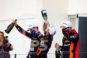 2021-10-24 - 25 Falb John (usa), Andrade Rui (prt), Menezes Gustavo (usa), G-Drive Racing, Aurus 01 - Gibson, podium during the 2021 4 Hours of Portimao, 5th round of the 2021 European Le Mans Series, from October 21 to 24, 2021 on the Algarve International Circuit, in Portimao, Portugal - 2021 4 HOURS OF PORTIMAO, 5TH ROUND OF THE 2021 EUROPEAN LE MANS SERIES - ENDURANCE - MOTORS