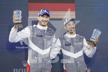 2021-10-30 - 92 Estre Kevin (fra), Jani Neel (che), Porsche GT Team, Porsche 911 RSR - 19, VAINQUEUR, WINNER PODIUM during the 6 Hours of Bahrain, 5th round of the 2021 FIA World Endurance Championship, FIA WEC, on the Bahrain International Circuit, from October 28 to 30, 2021 in Sakhir, Bahrain - 6 HOURS OF BAHRAIN, 5TH ROUND OF THE 2021 FIA WORLD ENDURANCE CHAMPIONSHIP, FIA WEC - ENDURANCE - MOTORS