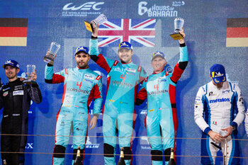 2021-10-30 - 33 Keating Ben (usa), Pereira Dylan (lux), Fraga Felipe (bra), TF Sport, Aston Martin Vantage AMR, podium during the 6 Hours of Bahrain, 5th round of the 2021 FIA World Endurance Championship, FIA WEC, on the Bahrain International Circuit, from October 28 to 30, 2021 in Sakhir, Bahrain - 6 HOURS OF BAHRAIN, 5TH ROUND OF THE 2021 FIA WORLD ENDURANCE CHAMPIONSHIP, FIA WEC - ENDURANCE - MOTORS