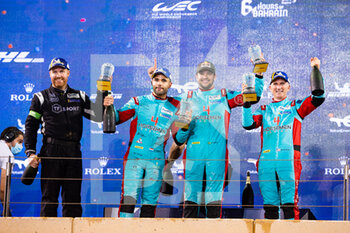2021-10-30 - 33 Keating Ben (usa), Pereira Dylan (lux), Fraga Felipe (bra), TF Sport, Aston Martin Vantage AMR, podium during the 6 Hours of Bahrain, 5th round of the 2021 FIA World Endurance Championship, FIA WEC, on the Bahrain International Circuit, from October 28 to 30, 2021 in Sakhir, Bahrain - 6 HOURS OF BAHRAIN, 5TH ROUND OF THE 2021 FIA WORLD ENDURANCE CHAMPIONSHIP, FIA WEC - ENDURANCE - MOTORS