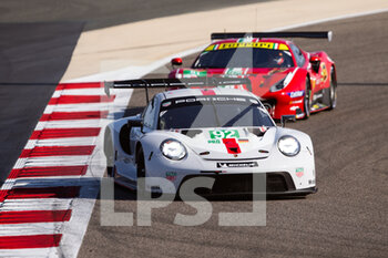 2021-11-06 - 92 Estre Kevin (fra), Jani Neel (che), Christensen Michael (dnk), Porsche GT Team, Porsche 911 RSR - 19, action during the 8 Hours of Bahrain, 6th round of the 2021 FIA World Endurance Championship, FIA WEC, on the Bahrain International Circuit, from November 4 to 6, 2021 in Sakhir, Bahrain - 8 HOURS OF BAHRAIN, 6TH ROUND OF THE 2021 FIA WORLD ENDURANCE CHAMPIONSHIP, FIA WEC - ENDURANCE - MOTORS