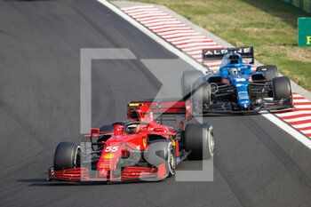 2021-08-01 - 55 SAINZ Carlos (spa), Scuderia Ferrari SF21, 14 ALONSO Fernando (spa), Alpine F1 A521, action during the Formula 1 Magyar Nagydij 2021, Hungarian Grand Prix, 11th round of the 2021 FIA Formula One World Championship from July 30 to August 1, 2021 on the Hungaroring, in Mogyorod, near Budapest, Hungary - Photo Antonin Vincent / DPPI - FORMULA 1 MAGYAR NAGYDIJ 2021, HUNGARIAN GRAND PRIX - FORMULA 1 - MOTORS