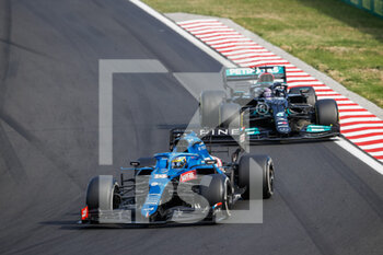 2021-08-01 - 14 ALONSO Fernando (spa), Alpine F1 A521, 44 HAMILTON Lewis (gbr), Mercedes AMG F1 GP W12 E Performance, action during the Formula 1 Magyar Nagydij 2021, Hungarian Grand Prix, 11th round of the 2021 FIA Formula One World Championship from July 30 to August 1, 2021 on the Hungaroring, in Mogyorod, near Budapest, Hungary - Photo Antonin Vincent / DPPI - FORMULA 1 MAGYAR NAGYDIJ 2021, HUNGARIAN GRAND PRIX - FORMULA 1 - MOTORS