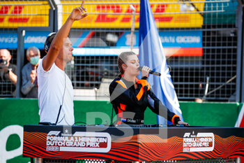 2021-09-05 - DJ Armin Van Buuren and Davina Michelle on the starting grid during the Formula 1 Heineken Dutch Grand Prix 2021, 13th round of the 2021 FIA Formula One World Championship from September 3 to 5, 2021 on the Circuit Zandvoort, in Zandvoort, Netherlands - FORMULA 1 HEINEKEN DUTCH GRAND PRIX 2021, 13TH ROUND OF THE 2021 FIA FORMULA ONE WORLD CHAMPIONSHIP - FORMULA 1 - MOTORS