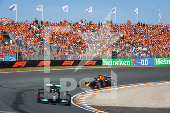 2021-09-05 - 77 BOTTAS Valtteri (fin), Mercedes AMG F1 GP W12 E Performance, 33 VERSTAPPEN Max (nld), Red Bull Racing Honda RB16B, action during the Formula 1 Heineken Dutch Grand Prix 2021, 13th round of the 2021 FIA Formula One World Championship from September 3 to 5, 2021 on the Circuit Zandvoort, in Zandvoort, Netherlands - FORMULA 1 HEINEKEN DUTCH GRAND PRIX 2021, 13TH ROUND OF THE 2021 FIA FORMULA ONE WORLD CHAMPIONSHIP - FORMULA 1 - MOTORS