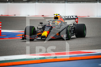 2021-09-25 - 11 PEREZ Sergio (mex), Red Bull Racing Honda RB16B, action during the Formula 1 VTB Russian Grand Prix 2021, 15th round of the 2021 FIA Formula One World Championship from September 24 to 26, 2021 on the Sochi Autodrom, in Sochi, Russia - FORMULA 1 VTB RUSSIAN GRAND PRIX 2021, 15TH ROUND OF THE 2021 FIA FORMULA ONE WORLD CHAMPIONSHIP - FORMULA 1 - MOTORS