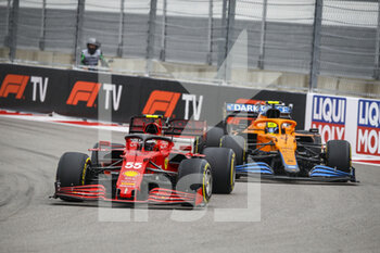 2021-09-26 - 55 SAINZ Carlos (spa), Scuderia Ferrari SF21, action and 04 NORRIS Lando (gbr), McLaren MCL35M during the Formula 1 VTB Russian Grand Prix 2021, 15th round of the 2021 FIA Formula One World Championship from September 24 to 26, 2021 on the Sochi Autodrom, in Sochi, Russia - FORMULA 1 VTB RUSSIAN GRAND PRIX 2021, 15TH ROUND OF THE 2021 FIA FORMULA ONE WORLD CHAMPIONSHIP - FORMULA 1 - MOTORS