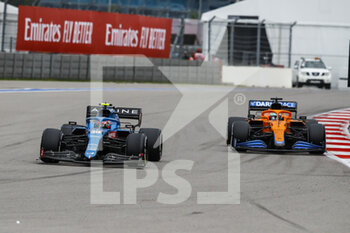 2021-09-26 - 31 OCON Esteban (fra), Alpine F1 A521, action 03 RICCIARDO Daniel (aus), McLaren MCL35M, action during the Formula 1 VTB Russian Grand Prix 2021, 15th round of the 2021 FIA Formula One World Championship from September 24 to 26, 2021 on the Sochi Autodrom, in Sochi, Russia - FORMULA 1 VTB RUSSIAN GRAND PRIX 2021, 15TH ROUND OF THE 2021 FIA FORMULA ONE WORLD CHAMPIONSHIP - FORMULA 1 - MOTORS