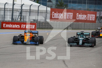 2021-09-26 - 03 RICCIARDO Daniel (aus), McLaren MCL35M, action and 18 STROLL Lance (can), Aston Martin F1 AMR21 during the Formula 1 VTB Russian Grand Prix 2021, 15th round of the 2021 FIA Formula One World Championship from September 24 to 26, 2021 on the Sochi Autodrom, in Sochi, Russia - FORMULA 1 VTB RUSSIAN GRAND PRIX 2021, 15TH ROUND OF THE 2021 FIA FORMULA ONE WORLD CHAMPIONSHIP - FORMULA 1 - MOTORS
