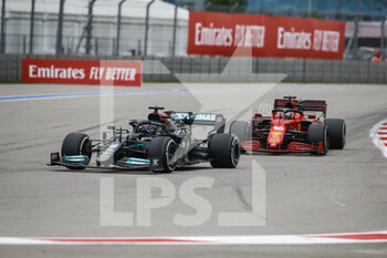 2021-09-26 - 44 HAMILTON Lewis (gbr), Mercedes AMG F1 GP W12 E Performance, action 16 LECLERC Charles (mco), Scuderia Ferrari SF21, action during the Formula 1 VTB Russian Grand Prix 2021, 15th round of the 2021 FIA Formula One World Championship from September 24 to 26, 2021 on the Sochi Autodrom, in Sochi, Russia - FORMULA 1 VTB RUSSIAN GRAND PRIX 2021, 15TH ROUND OF THE 2021 FIA FORMULA ONE WORLD CHAMPIONSHIP - FORMULA 1 - MOTORS