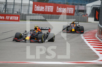 2021-09-26 - 11 PEREZ Sergio (mex), Red Bull Racing Honda RB16B, action 33 VERSTAPPEN Max (nld), Red Bull Racing Honda RB16B, action during the Formula 1 VTB Russian Grand Prix 2021, 15th round of the 2021 FIA Formula One World Championship from September 24 to 26, 2021 on the Sochi Autodrom, in Sochi, Russia - FORMULA 1 VTB RUSSIAN GRAND PRIX 2021, 15TH ROUND OF THE 2021 FIA FORMULA ONE WORLD CHAMPIONSHIP - FORMULA 1 - MOTORS
