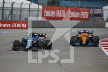 2021-09-26 - 14 ALONSO Fernando (spa), Alpine F1 A521, action 03 RICCIARDO Daniel (aus), McLaren MCL35M, action during the Formula 1 VTB Russian Grand Prix 2021, 15th round of the 2021 FIA Formula One World Championship from September 24 to 26, 2021 on the Sochi Autodrom, in Sochi, Russia - FORMULA 1 VTB RUSSIAN GRAND PRIX 2021, 15TH ROUND OF THE 2021 FIA FORMULA ONE WORLD CHAMPIONSHIP - FORMULA 1 - MOTORS