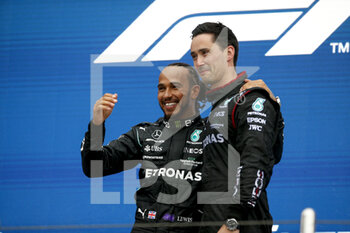 2021-09-26 - HAMILTON Lewis (gbr), Mercedes AMG F1 GP W12 E Performance, portrait celebrating his victory at the podium during the Formula 1 VTB Russian Grand Prix 2021, 15th round of the 2021 FIA Formula One World Championship from September 24 to 26, 2021 on the Sochi Autodrom, in Sochi, Russia - FORMULA 1 VTB RUSSIAN GRAND PRIX 2021, 15TH ROUND OF THE 2021 FIA FORMULA ONE WORLD CHAMPIONSHIP - FORMULA 1 - MOTORS