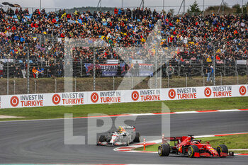 2021-10-09 - 16 LECLERC Charles (mco), Scuderia Ferrari SF21, action and 11 PEREZ Sergio (mex), Red Bull Racing Honda RB16B during the Formula 1 Rolex Turkish Grand Prix 2021, 16th round of the 2021 FIA Formula One World Championship from October 8 to 10, 2021 on the Istanbul Park, in Tuzla, Turkey - FORMULA 1 ROLEX TURKISH GRAND PRIX 2021, 16TH ROUND OF THE 2021 FIA FORMULA ONE WORLD CHAMPIONSHIP - FORMULA 1 - MOTORS