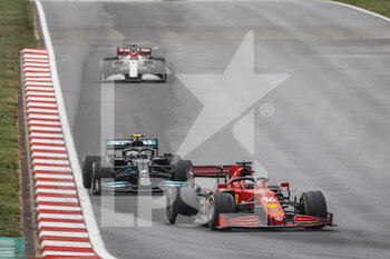 2021-10-10 - 16 LECLERC Charles (mco), Scuderia Ferrari SF21, action 77 BOTTAS Valtteri (fin), Mercedes AMG F1 GP W12 E Performance, action during the Formula 1 Rolex Turkish Grand Prix 2021, 16th round of the 2021 FIA Formula One World Championship from October 8 to 10, 2021 on the Istanbul Park, in Tuzla, Turkey - FORMULA 1 ROLEX TURKISH GRAND PRIX 2021, 16TH ROUND OF THE 2021 FIA FORMULA ONE WORLD CHAMPIONSHIP - FORMULA 1 - MOTORS