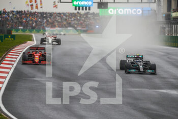 2021-10-10 - 77 BOTTAS Valtteri (fin), Mercedes AMG F1 GP W12 E Performance, action overtaking 16 LECLERC Charles (mco), Scuderia Ferrari SF21 during the Formula 1 Rolex Turkish Grand Prix 2021, 16th round of the 2021 FIA Formula One World Championship from October 8 to 10, 2021 on the Istanbul Park, in Tuzla, Turkey - FORMULA 1 ROLEX TURKISH GRAND PRIX 2021, 16TH ROUND OF THE 2021 FIA FORMULA ONE WORLD CHAMPIONSHIP - FORMULA 1 - MOTORS