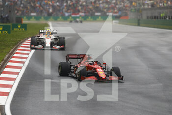 2021-10-10 - 16 LECLERC Charles (mco), Scuderia Ferrari SF21, action 11 PEREZ Sergio (mex), Red Bull Racing Honda RB16B, action during the Formula 1 Rolex Turkish Grand Prix 2021, 16th round of the 2021 FIA Formula One World Championship from October 8 to 10, 2021 on the Istanbul Park, in Tuzla, Turkey - FORMULA 1 ROLEX TURKISH GRAND PRIX 2021, 16TH ROUND OF THE 2021 FIA FORMULA ONE WORLD CHAMPIONSHIP - FORMULA 1 - MOTORS