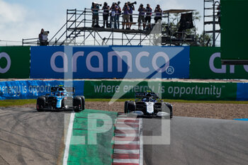 2021-10-24 - 31 OCON Esteban (fra), Alpine F1 A521, 06 LATIFI Nicholas (can), Williams Racing F1 FW43B, action during the Formula 1 Aramco United States Grand Prix 2021, 17th round of the 2021 FIA Formula One World Championship from October 21 to 24, 2021 on the Circuit of the Americas, in Austin, Texas, United States of American - FORMULA 1 ARAMCO UNITED STATES GRAND PRIX 2021, 17TH ROUND OF THE 2021 FIA FORMULA ONE WORLD CHAMPIONSHIP - FORMULA 1 - MOTORS