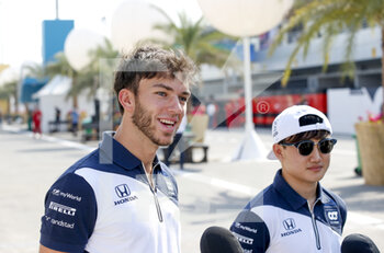 2021-11-19 - GASLY Pierre (fra), Scuderia AlphaTauri Honda AT02, TSUNODA Yuki (jap), Scuderia AlphaTauri Honda AT02, portrait during the Formula 1 Ooredoo Qatar Grand Prix 2021, 20th round of the 2021 FIA Formula One World Championship from November 19 to 21, 2021 on the Losail International Circuit, in Lusail, Qatar - FORMULA 1 OOREDOO QATAR GRAND PRIX 2021, 20TH ROUND OF THE 2021 FIA FORMULA ONE WORLD CHAMPIONSHIP - FORMULA 1 - MOTORS