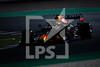 2021-11-19 - 11 PEREZ Sergio (mex), Red Bull Racing Honda RB16B, action during the Formula 1 Ooredoo Qatar Grand Prix 2021, 20th round of the 2021 FIA Formula One World Championship from November 19 to 21, 2021 on the Losail International Circuit, in Lusail, Qatar - FORMULA 1 OOREDOO QATAR GRAND PRIX 2021, 20TH ROUND OF THE 2021 FIA FORMULA ONE WORLD CHAMPIONSHIP - FORMULA 1 - MOTORS