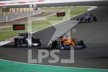 2021-11-21 - 03 RICCIARDO Daniel (aus), McLaren MCL35M, action 63 RUSSELL George (gbr), Williams Racing F1 FW43B, action during the Formula 1 Ooredoo Qatar Grand Prix 2021, 20th round of the 2021 FIA Formula One World Championship from November 19 to 21, 2021 on the Losail International Circuit, in Lusail, Qatar - FORMULA 1 OOREDOO QATAR GRAND PRIX 2021, 20TH ROUND OF THE 2021 FIA FORMULA ONE WORLD CHAMPIONSHIP - FORMULA 1 - MOTORS