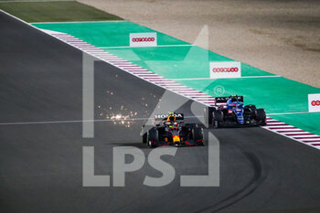 2021-11-21 - 11 PEREZ Sergio (mex), Red Bull Racing Honda RB16B, 31 OCON Esteban (fra), Alpine F1 A521, action during the Formula 1 Ooredoo Qatar Grand Prix 2021, 20th round of the 2021 FIA Formula One World Championship from November 19 to 21, 2021 on the Losail International Circuit, in Lusail, Qatar - FORMULA 1 OOREDOO QATAR GRAND PRIX 2021, 20TH ROUND OF THE 2021 FIA FORMULA ONE WORLD CHAMPIONSHIP - FORMULA 1 - MOTORS