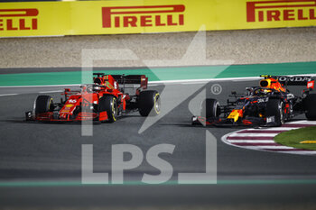 2021-11-21 - 16 LECLERC Charles (mco), Scuderia Ferrari SF21, action 11 PEREZ Sergio (mex), Red Bull Racing Honda RB16B, action during the Formula 1 Ooredoo Qatar Grand Prix 2021, 20th round of the 2021 FIA Formula One World Championship from November 19 to 21, 2021 on the Losail International Circuit, in Lusail, Qatar - FORMULA 1 OOREDOO QATAR GRAND PRIX 2021, 20TH ROUND OF THE 2021 FIA FORMULA ONE WORLD CHAMPIONSHIP - FORMULA 1 - MOTORS