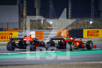 2021-11-21 - 11 PEREZ Sergio (mex), Red Bull Racing Honda RB16B, 16 LECLERC Charles (mco), Scuderia Ferrari SF21, action during the Formula 1 Ooredoo Qatar Grand Prix 2021, 20th round of the 2021 FIA Formula One World Championship from November 19 to 21, 2021 on the Losail International Circuit, in Lusail, Qatar - FORMULA 1 OOREDOO QATAR GRAND PRIX 2021, 20TH ROUND OF THE 2021 FIA FORMULA ONE WORLD CHAMPIONSHIP - FORMULA 1 - MOTORS