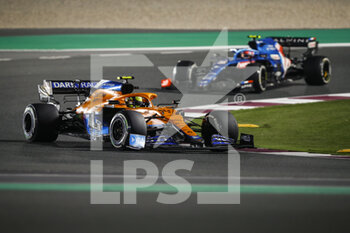 2021-11-21 - 04 NORRIS Lando (gbr), McLaren MCL35M, action 31 OCON Esteban (fra), Alpine F1 A521, action during the Formula 1 Ooredoo Qatar Grand Prix 2021, 20th round of the 2021 FIA Formula One World Championship from November 19 to 21, 2021 on the Losail International Circuit, in Lusail, Qatar - FORMULA 1 OOREDOO QATAR GRAND PRIX 2021, 20TH ROUND OF THE 2021 FIA FORMULA ONE WORLD CHAMPIONSHIP - FORMULA 1 - MOTORS