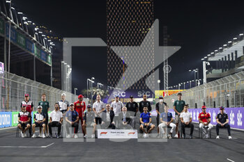 2021-12-05 - F1 Drivers, Stefano Domenicali CEO of Formula One Group, celebrating Jean Todt during the Formula 1 stc Saudi Arabian Grand Prix 2021, 21th round of the 2021 FIA Formula One World Championship from December 3 to 5, 2021 on the Jeddah Corniche Circuit, in Jeddah, Saudi Arabia - FORMULA 1 STC SAUDI ARABIAN GRAND PRIX 2021, 21TH ROUND OF THE 2021 FIA FORMULA ONE WORLD CHAMPIONSHIP - FORMULA 1 - MOTORS