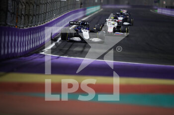 2021-12-05 - 63 RUSSELL George (gbr), Williams Racing F1 FW43B, 47 SCHUMACHER Mick (ger), Haas F1 Team VF-21 Ferrari, action during the Formula 1 stc Saudi Arabian Grand Prix 2021, 21th round of the 2021 FIA Formula One World Championship from December 3 to 5, 2021 on the Jeddah Corniche Circuit, in Jeddah, Saudi Arabia - FORMULA 1 STC SAUDI ARABIAN GRAND PRIX 2021, 21TH ROUND OF THE 2021 FIA FORMULA ONE WORLD CHAMPIONSHIP - FORMULA 1 - MOTORS