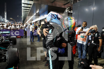 2021-12-05 - HAMILTON Lewis (gbr), Mercedes AMG F1 GP W12 E Performance, portrait celebrating victory with BOTTAS Valtteri (fin), Mercedes AMG F1 GP W12 E Performance, portrait during the Formula 1 stc Saudi Arabian Grand Prix 2021, 21th round of the 2021 FIA Formula One World Championship from December 3 to 5, 2021 on the Jeddah Corniche Circuit, in Jeddah, Saudi Arabia - FORMULA 1 STC SAUDI ARABIAN GRAND PRIX 2021, 21TH ROUND OF THE 2021 FIA FORMULA ONE WORLD CHAMPIONSHIP - FORMULA 1 - MOTORS