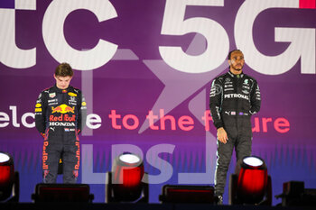 2021-12-05 - VERSTAPPEN Max (ned), Red Bull Racing Honda RB16B, HAMILTON Lewis (gbr), Mercedes AMG F1 GP W12 E Performance, podium during the Formula 1 stc Saudi Arabian Grand Prix 2021, 21th round of the 2021 FIA Formula One World Championship from December 3 to 5, 2021 on the Jeddah Corniche Circuit, in Jeddah, Saudi Arabia - FORMULA 1 STC SAUDI ARABIAN GRAND PRIX 2021, 21TH ROUND OF THE 2021 FIA FORMULA ONE WORLD CHAMPIONSHIP - FORMULA 1 - MOTORS