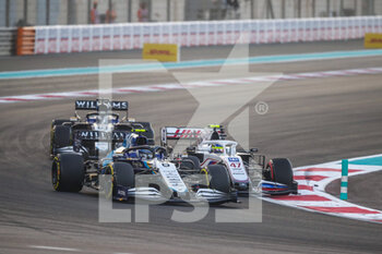 2021-12-12 - 06 LATIFI Nicholas (can), Williams Racing F1 FW43B, action and 47 SCHUMACHER Mick (ger), Haas F1 Team VF-21 Ferrari during the Formula 1 Etihad Airways Abu Dhabi Grand Prix 2021, 22th round of the 2021 FIA Formula One World Championship from December 10 to 12, 2021 on the Yas Marina Circuit, in Yas Island, Abu Dhabi - FORMULA 1 ETIHAD AIRWAYS ABU DHABI GRAND PRIX 2021, 22TH ROUND OF THE 2021 FIA FORMULA ONE WORLD CHAMPIONSHIP - FORMULA 1 - MOTORS