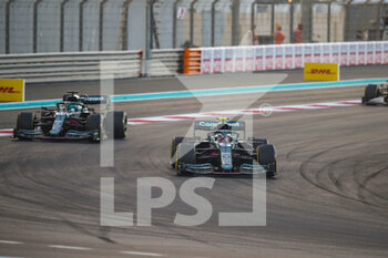 2021-12-12 - 05 VETTEL Sebastian (ger), Aston Martin F1 AMR21, action and 18 STROLL Lance (can), Aston Martin F1 AMR21 during the Formula 1 Etihad Airways Abu Dhabi Grand Prix 2021, 22th round of the 2021 FIA Formula One World Championship from December 10 to 12, 2021 on the Yas Marina Circuit, in Yas Island, Abu Dhabi - FORMULA 1 ETIHAD AIRWAYS ABU DHABI GRAND PRIX 2021, 22TH ROUND OF THE 2021 FIA FORMULA ONE WORLD CHAMPIONSHIP - FORMULA 1 - MOTORS
