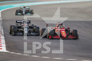 2021-12-12 - 16 LECLERC Charles (mco), Scuderia Ferrari SF21, action and 10 GASLY Pierre (fra), Scuderia AlphaTauri Honda AT02 during the Formula 1 Etihad Airways Abu Dhabi Grand Prix 2021, 22th round of the 2021 FIA Formula One World Championship from December 10 to 12, 2021 on the Yas Marina Circuit, in Yas Island, Abu Dhabi - FORMULA 1 ETIHAD AIRWAYS ABU DHABI GRAND PRIX 2021, 22TH ROUND OF THE 2021 FIA FORMULA ONE WORLD CHAMPIONSHIP - FORMULA 1 - MOTORS