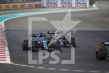 2021-12-12 - 14 ALONSO Fernando (spa), Alpine F1 A521, action and 10 GASLY Pierre (fra), Scuderia AlphaTauri Honda AT02 during the Formula 1 Etihad Airways Abu Dhabi Grand Prix 2021, 22th round of the 2021 FIA Formula One World Championship from December 10 to 12, 2021 on the Yas Marina Circuit, in Yas Island, Abu Dhabi - FORMULA 1 ETIHAD AIRWAYS ABU DHABI GRAND PRIX 2021, 22TH ROUND OF THE 2021 FIA FORMULA ONE WORLD CHAMPIONSHIP - FORMULA 1 - MOTORS