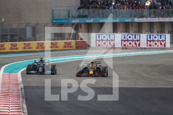 2021-12-12 - 44 HAMILTON Lewis (gbr), Mercedes AMG F1 GP W12 E Performance and 11 PEREZ Sergio (mex), Red Bull Racing Honda RB16B, action during the Formula 1 Etihad Airways Abu Dhabi Grand Prix 2021, 22th round of the 2021 FIA Formula One World Championship from December 10 to 12, 2021 on the Yas Marina Circuit, in Yas Island, Abu Dhabi - FORMULA 1 ETIHAD AIRWAYS ABU DHABI GRAND PRIX 2021, 22TH ROUND OF THE 2021 FIA FORMULA ONE WORLD CHAMPIONSHIP - FORMULA 1 - MOTORS