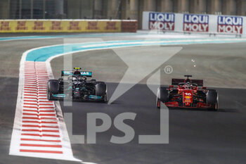2021-12-12 - 77 BOTTAS Valtteri (fin), Mercedes AMG F1 GP W12 E Performance, action and 16 LECLERC Charles (mco), Scuderia Ferrari SF21, during the Formula 1 Etihad Airways Abu Dhabi Grand Prix 2021, 22th round of the 2021 FIA Formula One World Championship from December 10 to 12, 2021 on the Yas Marina Circuit, in Yas Island, Abu Dhabi - FORMULA 1 ETIHAD AIRWAYS ABU DHABI GRAND PRIX 2021, 22TH ROUND OF THE 2021 FIA FORMULA ONE WORLD CHAMPIONSHIP - FORMULA 1 - MOTORS