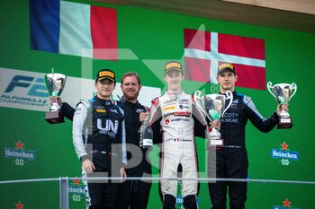 2021-09-11 - Podium, Zhou Guanyu (chn), UNI-Virtuosi Racing, Dallara F2, Pourchaire Théo (fra), ART Grand Prix, Dallara F2, Lundgaard Christian (dnk), ART Grand Prix, Dallara F2, portrait during the 5th round of the 2021 FIA Formula 2 Championship from September 9 to 12, 2021 on the Autodromo Nazionale di Monza, in Monza, Italy - 5TH ROUND OF THE 2021 FIA FORMULA 2 CHAMPIONSHIP - FORMULA 2 - MOTORS