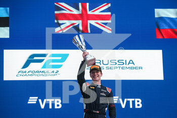 2021-09-24 - Ticktum Dan (gbr), Carlin, Dallara F2, portrait, podium celebrating his win in Race 1 during the 6th round of the 2021 FIA Formula 2 Championship from September 24 to 26, 2021 on the Sochi Autodrom, in Sochi, Russia - 6TH ROUND OF THE 2021 FIA FORMULA 2 CHAMPIONSHIP - FORMULA 2 - MOTORS