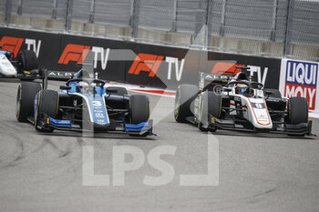 2021-09-26 - 03 Zhou Guanyu (chn), UNI-Virtuosi Racing, Dallara F2, action 09 Lundgaard Christian (dnk), ART Grand Prix, Dallara F2, action during the 6th round of the 2021 FIA Formula 2 Championship from September 24 to 26, 2021 on the Sochi Autodrom, in Sochi, Russia - 6TH ROUND OF THE 2021 FIA FORMULA 2 CHAMPIONSHIP - FORMULA 2 - MOTORS