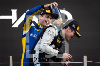 2021-12-12 - Drugovich Felipe (bra), UNI-Virtuosi Racing, Dallara F2, Zhou Guanyu (chn), UNI-Virtuosi Racing, Dallara F2, portrait during the 8th round of the 2021 FIA Formula 2 Championship from December 10 to 12, 2021 on the Yas Marina Circuit, in Yas Island, Abu Dhabi - 8TH ROUND OF THE 2021 FIA FORMULA 2 CHAMPIONSHIP - FORMULA 2 - MOTORS