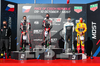 10/10/2021 - Podium of race 1: Girolami Nestor (arg), ALL-INKL.COM Munnich Motorsport, Honda Civic Type R TCR (FK8), Guerrieri Esteban (arg), ALL-INKL.COM Munnich Motorsport, Honda Civic Type R TCR (FK8), Ehrlacher Yann (fra), Cyan Racing Lynk & Co, Lync & Co 03 TCR, Coronel Tom (ndl), Comtoyou DHL Team Audi Sport, Audi RS 3 LMS TCR (2021), portrait during the 2021 FIA WTCR Race of Czech Republic, 5th round of the 2021 FIA World Touring Car Cup, on the Autodrom Most, from October 8 to 10, 2021 in Most, Czech Republic - 2021 FIA WTCR RACE OF CZECH REPUBLIC, 5TH ROUND OF THE 2021 FIA WORLD TOURING CAR CUP - TURISMO E GRAN TURISMO - MOTORI