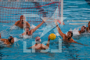 2021-09-24 - ZIVKOVIC Duje (Montpellier), VILCOT Thomas (Montpellier), Andrea Fondelli (Savona)
 and DELAS Ivan (Montpellier) - CARIGE R.N. SAVONA (ITA) VS MONTPELLIER WATERPOLO (FRA) - LEN CUP - CHAMPIONS LEAGUE - WATERPOLO