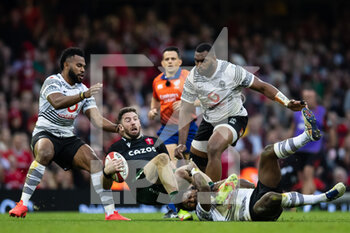 2021-11-14 - Alex Cuthbert of Wales is tackled by Frank Lomani of Fiji during the Autumn Nations Series 2021, rugby union test match between Wales and Fiji on November 14, 2021 at Principality Stadium in Cardiff, Wales - TEST MATCH 2021 - WALES VS FIJI - AUTUMN NATIONS SERIES - RUGBY